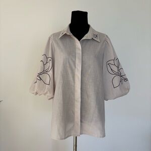 Elegant Cream Women's Top with Floral Embroidery